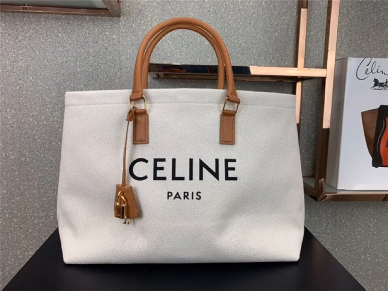 CELINE-HORIZONTAL-CABAS-CELINE-IN-CANVAS-WITH-CELINE-PRINT-AND-CALFSKIN-190062BNZ.02NT-01 CELINE HORIZONTAL CABAS CELINE IN CANVAS WITH CELINE PRINT AND CALFSKIN 190062BNZ.02NT 01