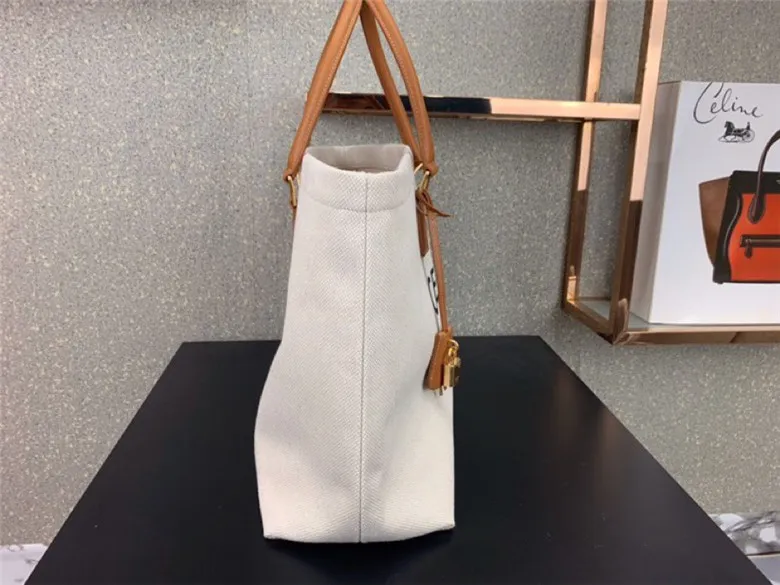 CELINE-HORIZONTAL-CABAS-CELINE-IN-CANVAS-WITH-CELINE-PRINT-AND-CALFSKIN-190062BNZ.02NT-02 CELINE HORIZONTAL CABAS CELINE IN CANVAS WITH CELINE PRINT AND CALFSKIN 190062BNZ.02NT 02