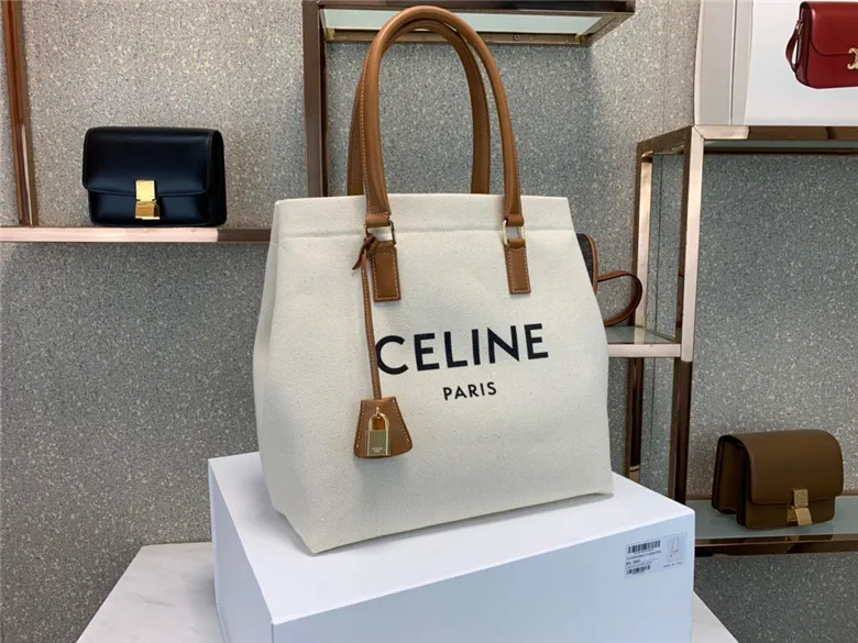 CELINE-HORIZONTAL-CABAS-CELINE-IN-CANVAS-WITH-CELINE-PRINT-AND-CALFSKIN-NATURAL-TAN-192162BNZ.02NT-01 CELINE HORIZONTAL CABAS CELINE IN CANVAS WITH CELINE PRINT AND CALFSKIN NATURAL TAN 192162BNZ.02NT 01