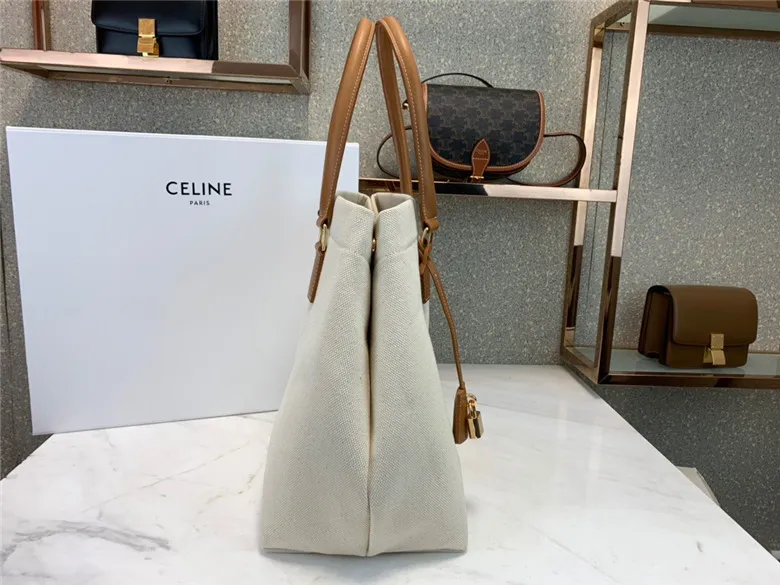 CELINE-HORIZONTAL-CABAS-CELINE-IN-CANVAS-WITH-CELINE-PRINT-AND-CALFSKIN-NATURAL-TAN-192162BNZ.02NT-03 CELINE HORIZONTAL CABAS CELINE IN CANVAS WITH CELINE PRINT AND CALFSKIN NATURAL TAN 192162BNZ.02NT 03