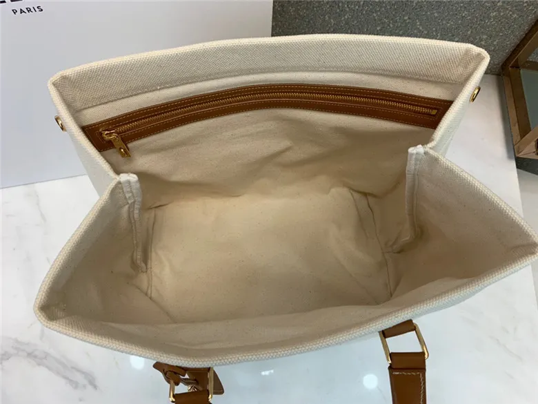 CELINE-HORIZONTAL-CABAS-CELINE-IN-CANVAS-WITH-CELINE-PRINT-AND-CALFSKIN-NATURAL-TAN-192162BNZ.02NT-04 CELINE HORIZONTAL CABAS CELINE IN CANVAS WITH CELINE PRINT AND CALFSKIN NATURAL TAN 192162BNZ.02NT 04