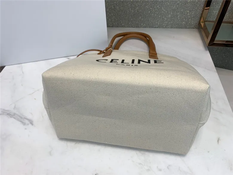 CELINE-HORIZONTAL-CABAS-CELINE-IN-CANVAS-WITH-CELINE-PRINT-AND-CALFSKIN-NATURAL-TAN-192162BNZ.02NT-09 CELINE HORIZONTAL CABAS CELINE IN CANVAS WITH CELINE PRINT AND CALFSKIN NATURAL TAN 192162BNZ.02NT 09