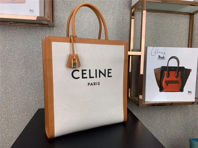CELINE-VERTICAL-CABAS-CELINE-IN-CANVAS-WITH-CELINE-PRINT-AND-CALFSKIN-NATURAL-TAN-190402BNZ.02NT-02 CELINE VERTICAL CABAS CELINE IN CANVAS WITH CELINE PRINT AND CALFSKIN NATURAL TAN 190402BNZ.02NT 02