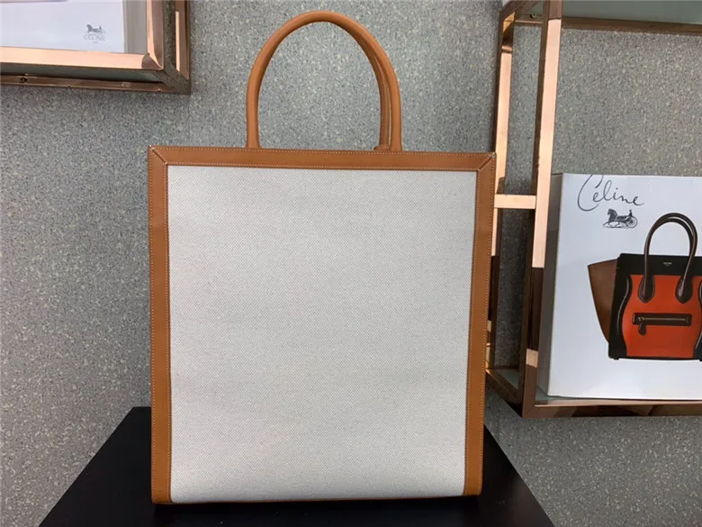 CELINE-VERTICAL-CABAS-CELINE-IN-CANVAS-WITH-CELINE-PRINT-AND-CALFSKIN-NATURAL-TAN-190402BNZ.02NT-03 CELINE VERTICAL CABAS CELINE IN CANVAS WITH CELINE PRINT AND CALFSKIN NATURAL TAN 190402BNZ.02NT 03