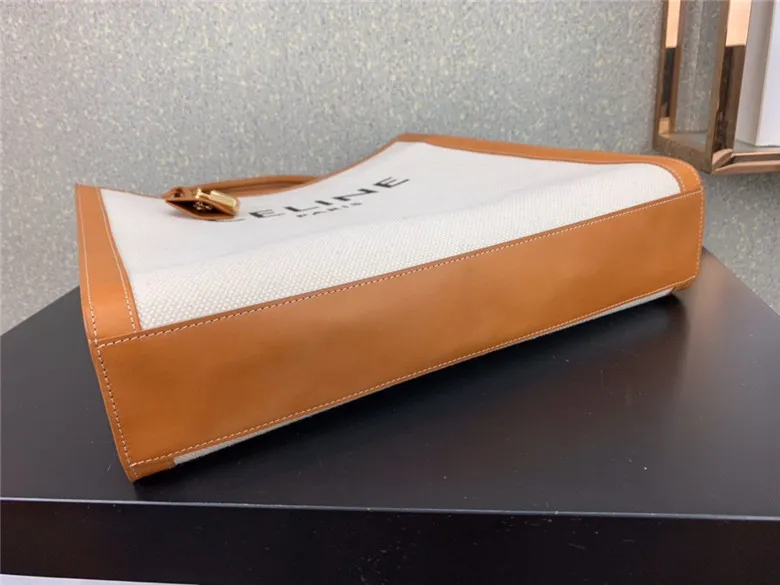 CELINE-VERTICAL-CABAS-CELINE-IN-CANVAS-WITH-CELINE-PRINT-AND-CALFSKIN-NATURAL-TAN-190402BNZ.02NT-09 CELINE VERTICAL CABAS CELINE IN CANVAS WITH CELINE PRINT AND CALFSKIN NATURAL TAN 190402BNZ.02NT 09