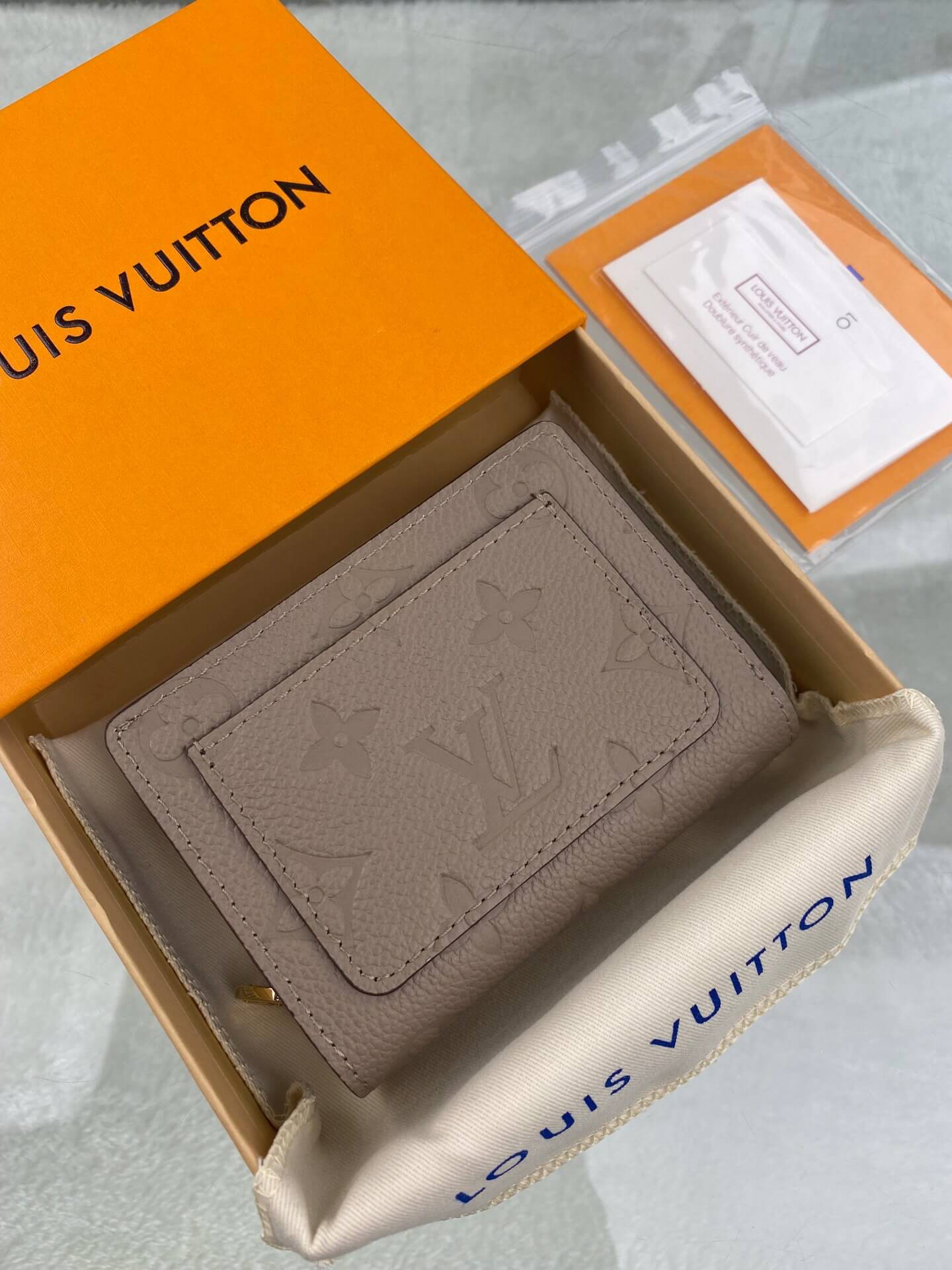 louis-vuitton-cléa-wallet-monogram-empreinte-leather-wallets-and-small-leather-goods-M80152-01 louis vuitton clea wallet monogram empreinte leather wallets and small leather goods M80152 01