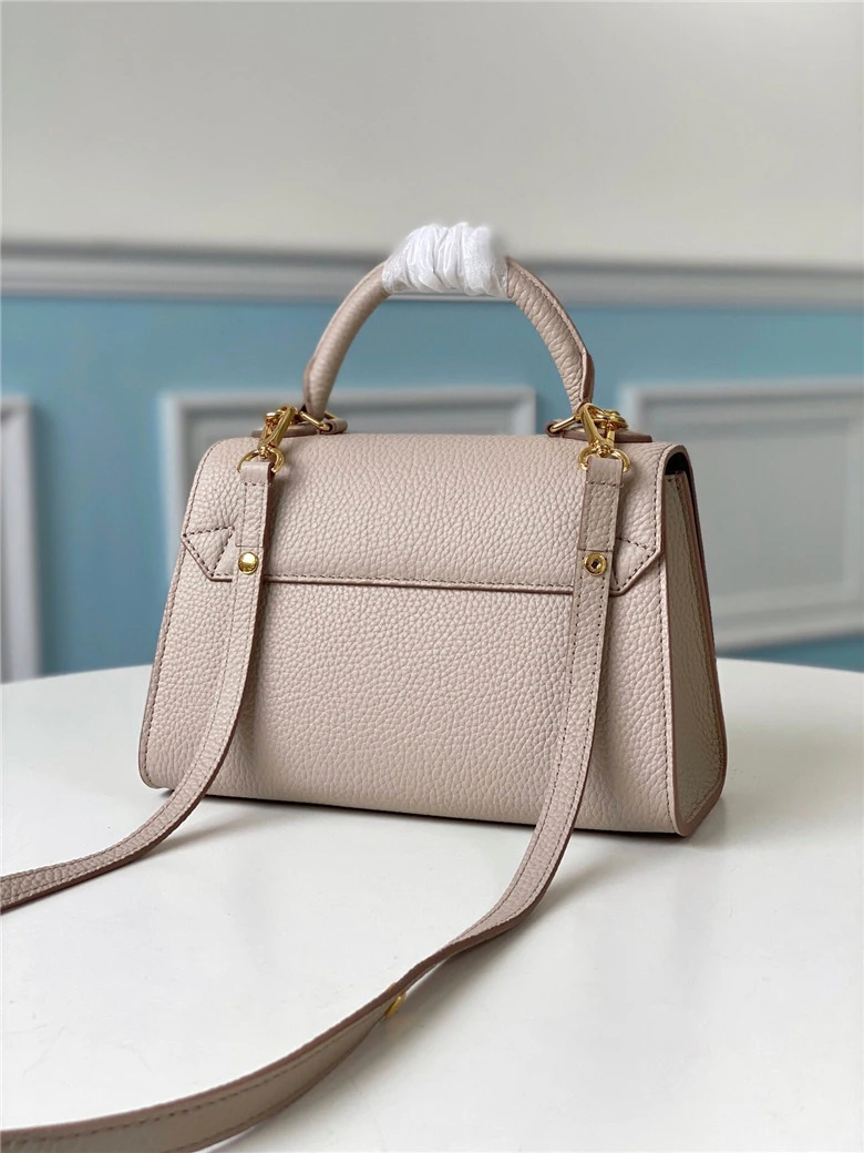 LOUIS VUITTON TWIST ONE HANDLE PM HANDBAG TAURILLON LEATHER GREIGE M57214_3 LOUIS VUITTON TWIST ONE HANDLE PM HANDBAG TAURILLON LEATHER GREIGE M57214 3