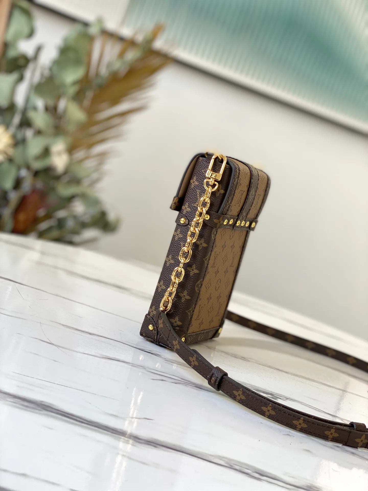 LOUIS VUITTON VERTICAL TRUNK POCHETTE BAG MONOGRAM REVERSE COATED CANVAS M67873_2 LOUIS VUITTON VERTICAL TRUNK POCHETTE BAG MONOGRAM REVERSE COATED CANVAS M67873 2