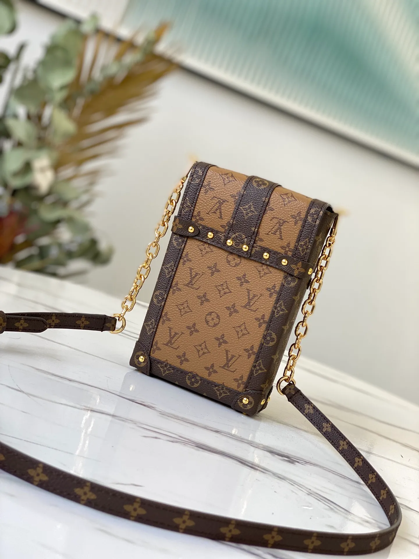 LOUIS VUITTON VERTICAL TRUNK POCHETTE BAG MONOGRAM REVERSE COATED CANVAS M67873_3 LOUIS VUITTON VERTICAL TRUNK POCHETTE BAG MONOGRAM REVERSE COATED CANVAS M67873 3