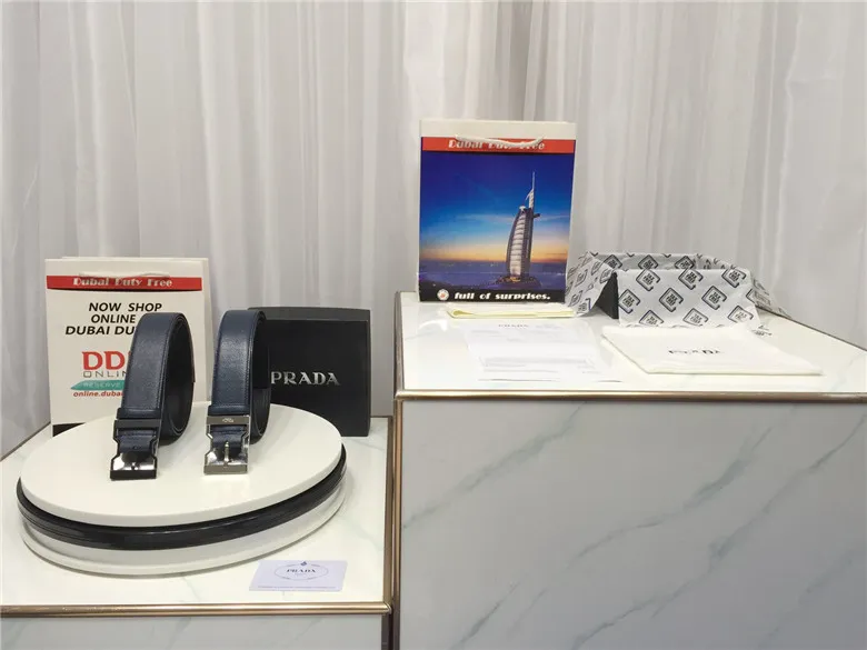 PRADA-SAFFIANO-LEATHER-BELT-BALTIC-BLUE-2CM185_053_F0216-01 PRADA SAFFIANO LEATHER BELT BALTIC BLUE 2CM185 053 F0216 01