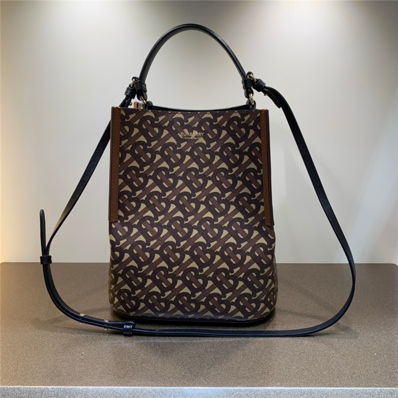 BURBERRY-SMALL-MONOGRAM-E-CANVAS-PEGGY-BUCKET-BAG-BROWN-80268251-01 BURBERRY SMALL MONOGRAM E CANVAS PEGGY BUCKET BAG BROWN 80268251 01