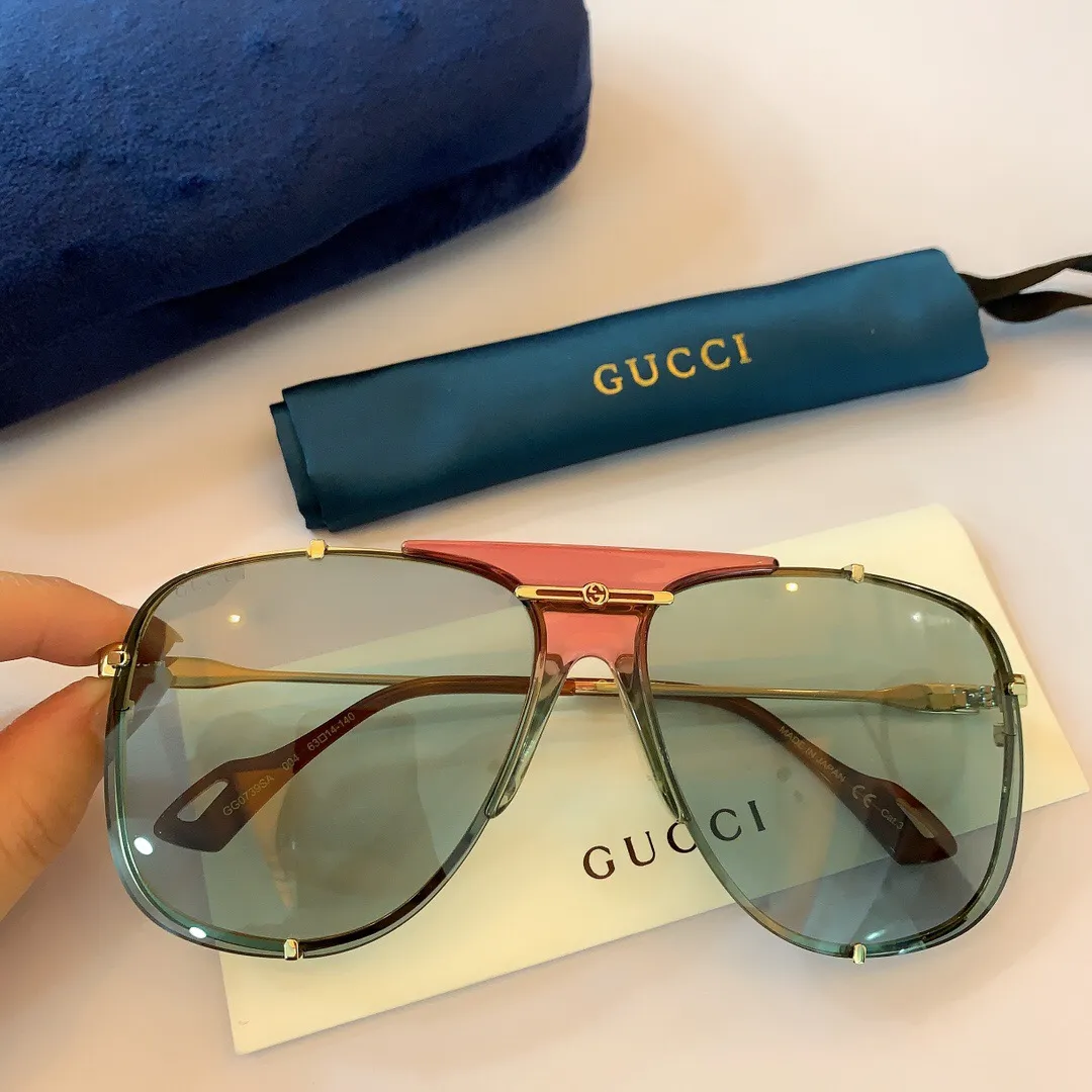 GUCCI-GOLD-FRAME-BLUE-LENS-SUNGLASSES-GG0739S-005-04 GUCCI GOLD FRAME BLUE LENS SUNGLASSES GG0739S 005 04