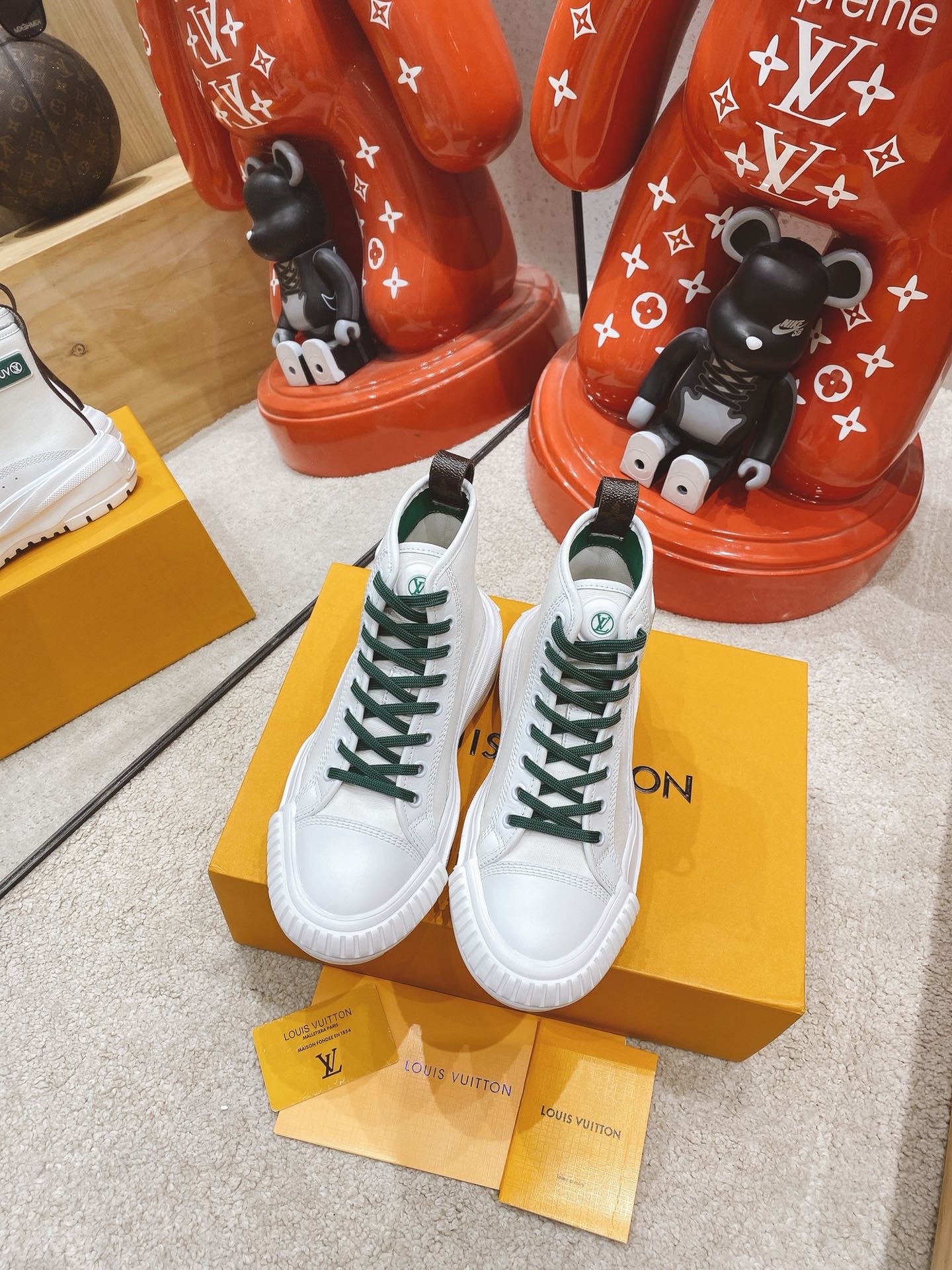 LOUIS VUITTON LV SQUAD SNEAKER BOOT 1A9411 02 LOUIS VUITTON LV SQUAD SNEAKER BOOT 1A9411 02