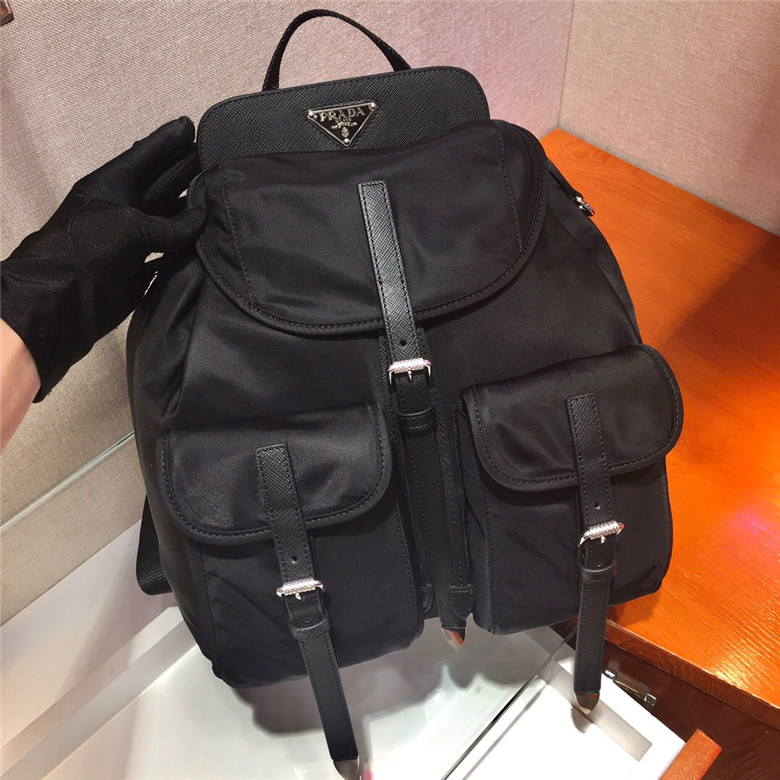 PRADA-NYLON-AND-SAFFIANO-LEATHER-BACKPACK-BLACK-1BZ063_V44_F0002_V_OOH-02 PRADA NYLON AND SAFFIANO LEATHER BACKPACK BLACK 1BZ063 V44 F0002 V OOH 02