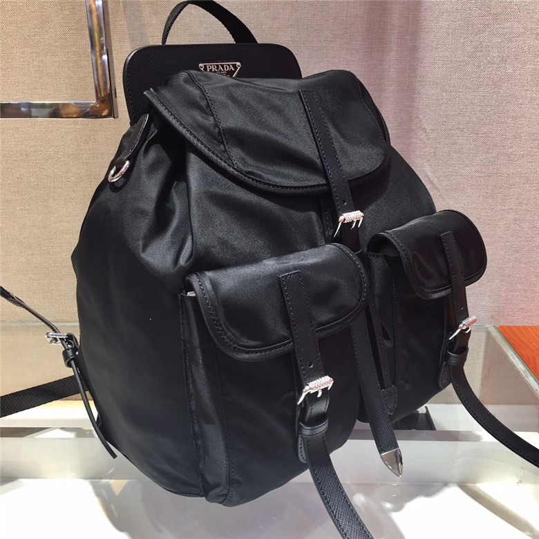 PRADA-NYLON-AND-SAFFIANO-LEATHER-BACKPACK-BLACK-1BZ063_V44_F0002_V_OOH-03 PRADA NYLON AND SAFFIANO LEATHER BACKPACK BLACK 1BZ063 V44 F0002 V OOH 03