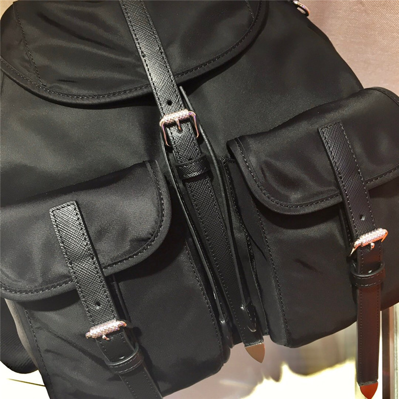 PRADA-NYLON-AND-SAFFIANO-LEATHER-BACKPACK-BLACK-1BZ063_V44_F0002_V_OOH-04 PRADA NYLON AND SAFFIANO LEATHER BACKPACK BLACK 1BZ063 V44 F0002 V OOH 04