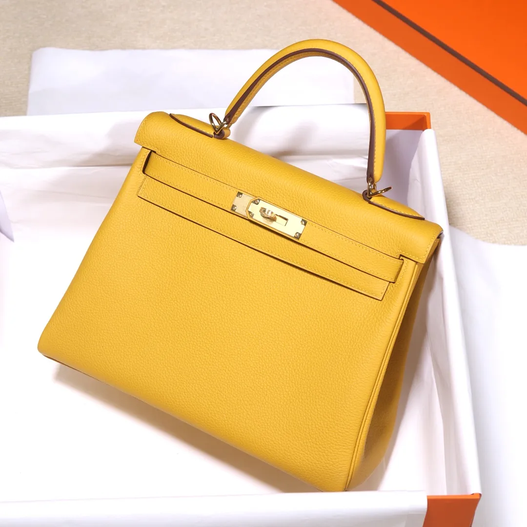 HERMES-KELLY-28-TOGO-RETOURNE-LEATHER-GOLD-HARDWARE-AMBRE_1 HERMES KELLY 28 TOGO RETOURNE LEATHER GOLD HARDWARE AMBRE 1