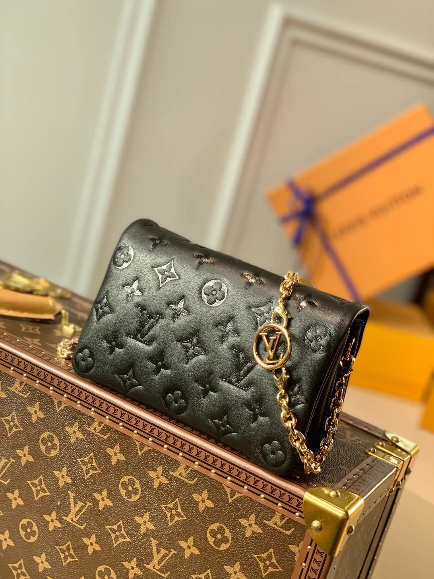 LOUIS VUITTON POCHETTE COUSSIN HANDBAG MONOGRAM-EMBOSSED LAMBSKIN BLACK M80742_01 LOUIS VUITTON POCHETTE COUSSIN HANDBAG MONOGRAM EMBOSSED LAMBSKIN BLACK M80742 01
