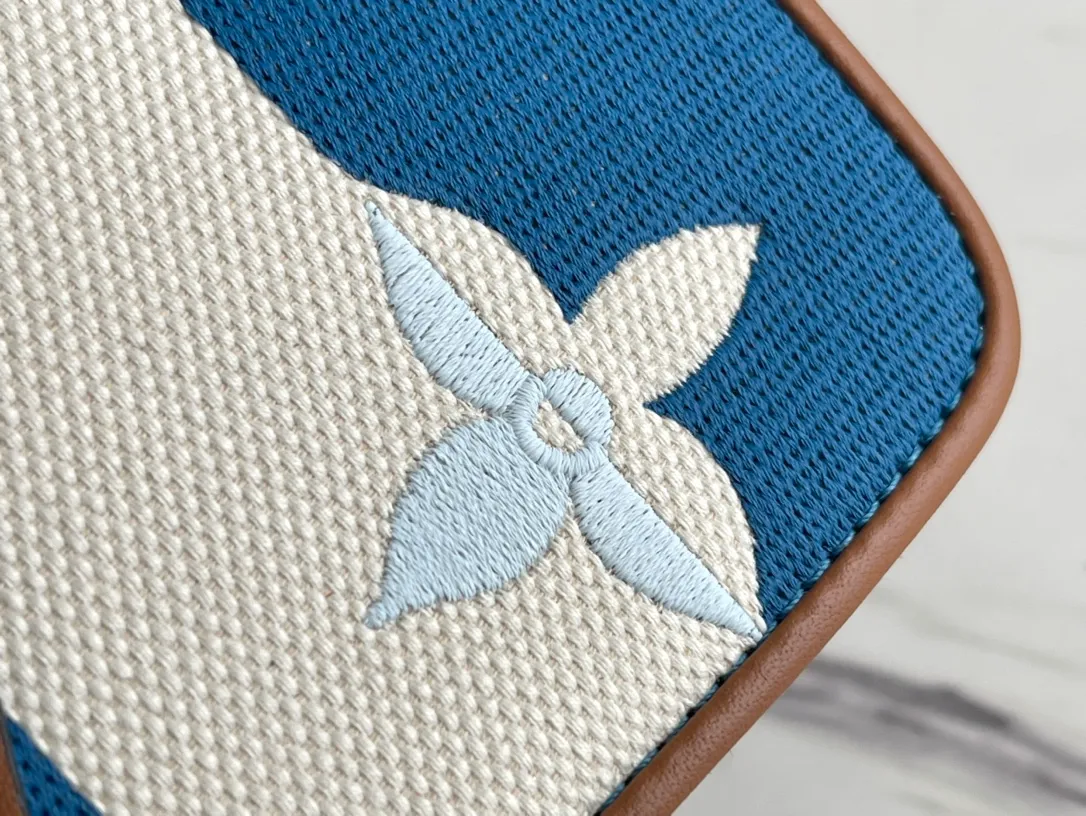 LOUIS VUITTON TWIST MM HANDBAG EMBROIDERED CANVAS AND CALF LEATHER BLUE M57659_07 LOUIS VUITTON TWIST MM HANDBAG EMBROIDERED CANVAS AND CALF LEATHER BLUE M57659 07