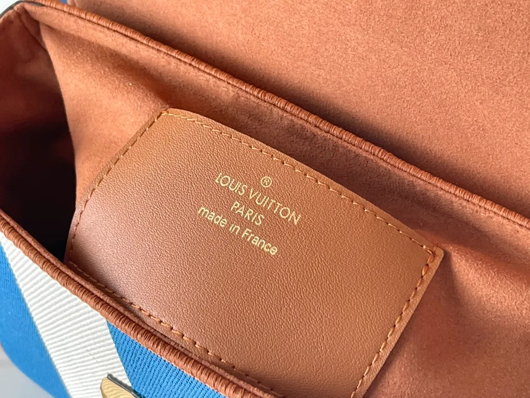 LOUIS VUITTON TWIST MM HANDBAG EMBROIDERED CANVAS AND CALF LEATHER BLUE M57659_09 LOUIS VUITTON TWIST MM HANDBAG EMBROIDERED CANVAS AND CALF LEATHER BLUE M57659 09