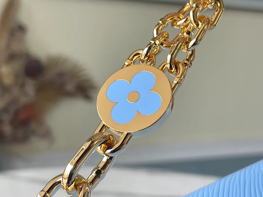 LOUIS VUITTON TWIST MM HANDBAG EPI GRAINED LEATHER QUARTZ BLEU NUAGE BLUE M59627_8 LOUIS VUITTON TWIST MM HANDBAG EPI GRAINED LEATHER QUARTZ BLEU NUAGE BLUE M59627 8