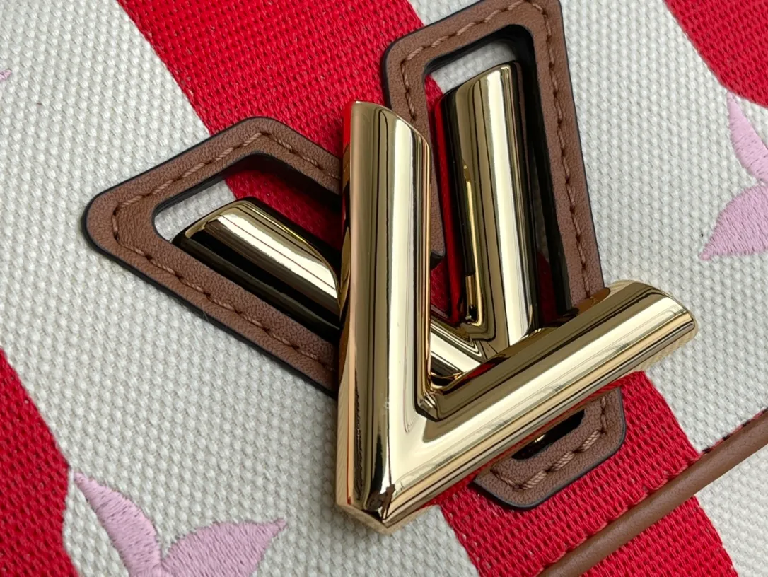 LOUIS VUITTON TWIST PM HANDBAG EMBROIDERED CANVAS AND CALF LEATHER RED M57722_06 LOUIS VUITTON TWIST PM HANDBAG EMBROIDERED CANVAS AND CALF LEATHER RED M57722 06