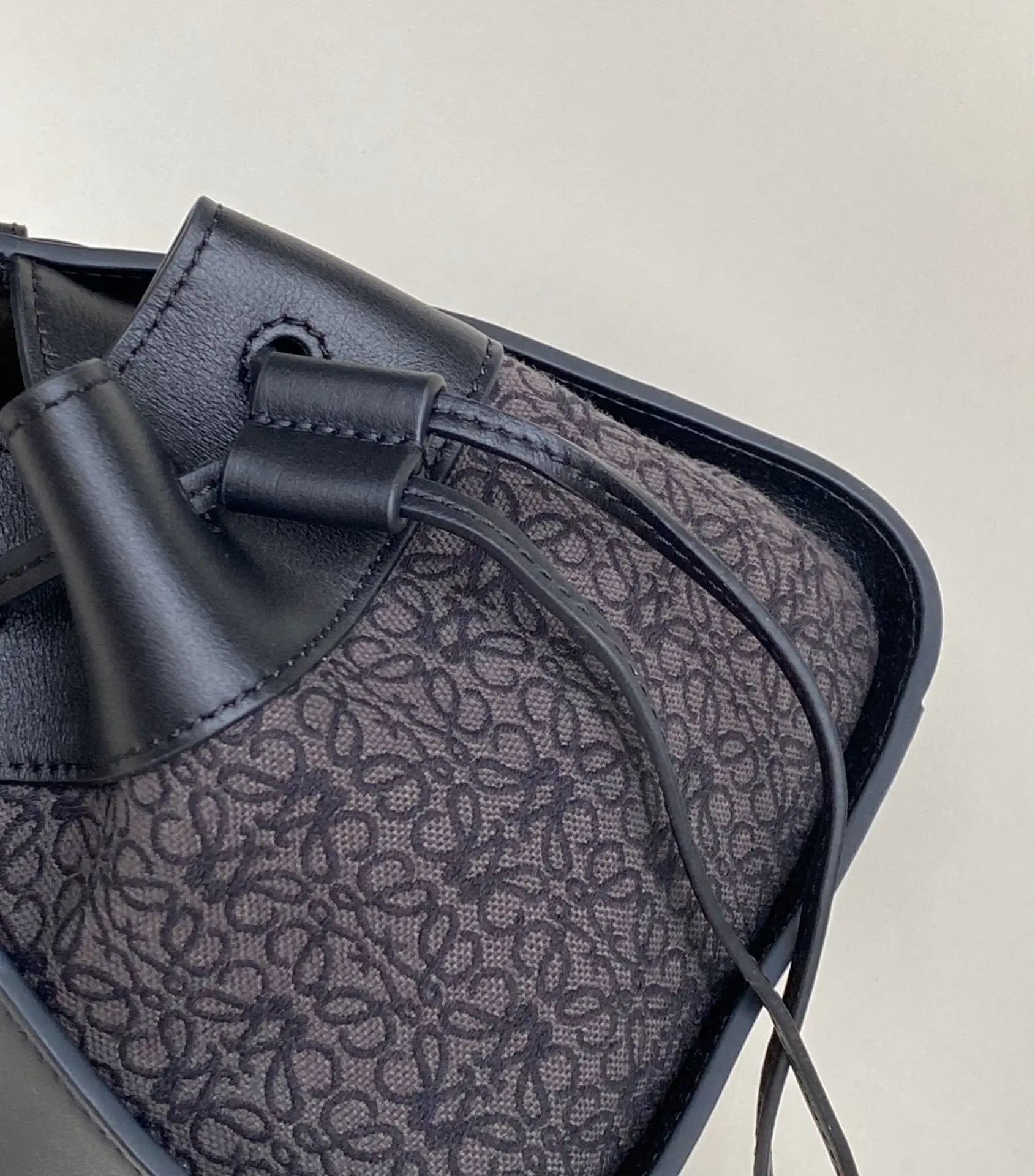 LOEWE-MINI-HAMMOCK-DRAWSTRING-BAG-ANAGRAM-JACQUARD-CALFSKIN-BLACK-A538V07X11-1268_4 LOEWE MINI HAMMOCK DRAWSTRING BAG ANAGRAM JACQUARD CALFSKIN BLACK A538V07X11 1268 4