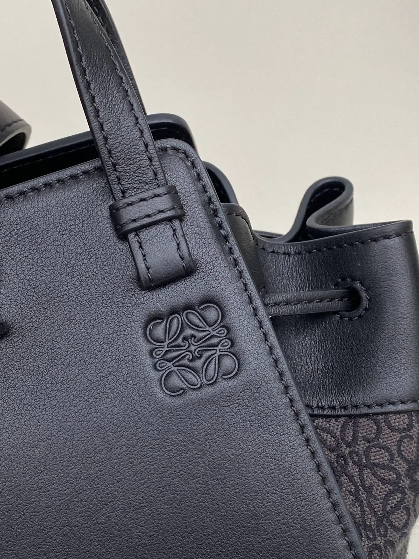 LOEWE-MINI-HAMMOCK-DRAWSTRING-BAG-ANAGRAM-JACQUARD-CALFSKIN-BLACK-A538V07X11-1268_5 LOEWE MINI HAMMOCK DRAWSTRING BAG ANAGRAM JACQUARD CALFSKIN BLACK A538V07X11 1268 5