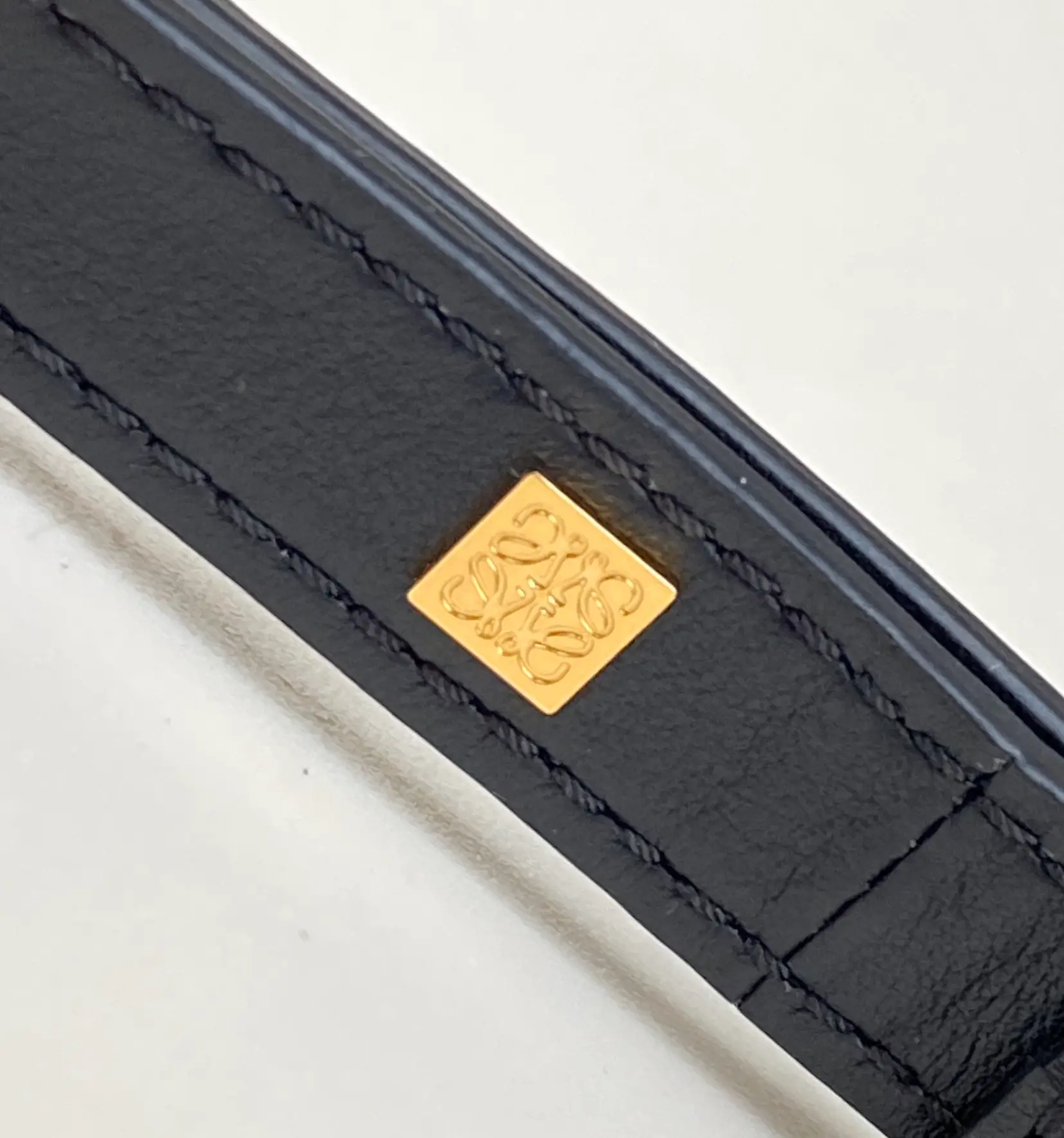 LOEWE-MINI-HAMMOCK-DRAWSTRING-BAG-ANAGRAM-JACQUARD-CALFSKIN-BLACK-A538V07X11-1268_9 LOEWE MINI HAMMOCK DRAWSTRING BAG ANAGRAM JACQUARD CALFSKIN BLACK A538V07X11 1268 9