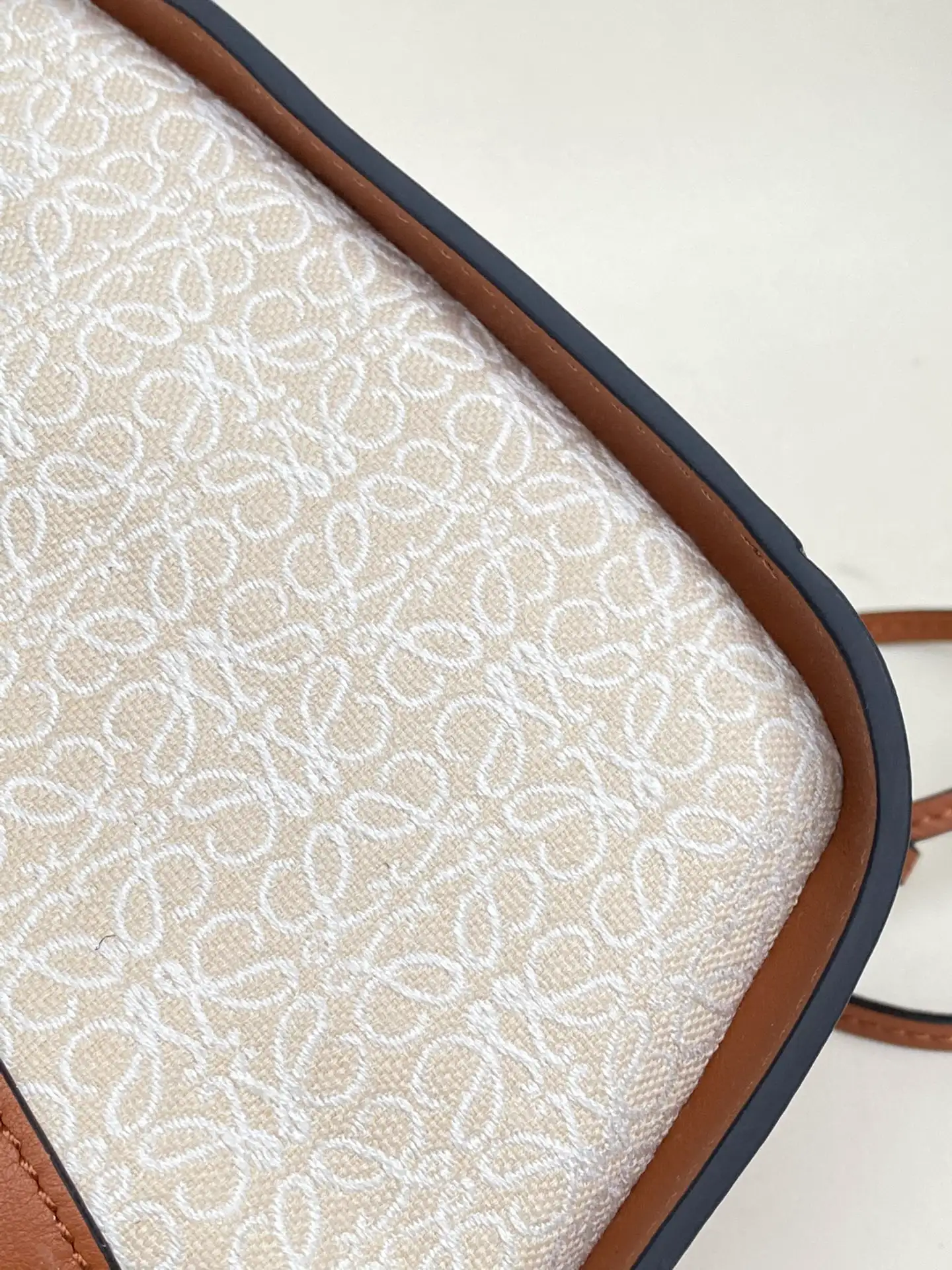 LOEWE-MINI-HAMMOCK-DRAWSTRING-BAG-ANAGRAM-JACQUARD-CALFSKIN-TAN-A538V07X11-2426_7 LOEWE MINI HAMMOCK DRAWSTRING BAG ANAGRAM JACQUARD CALFSKIN TAN A538V07X11 2426 7