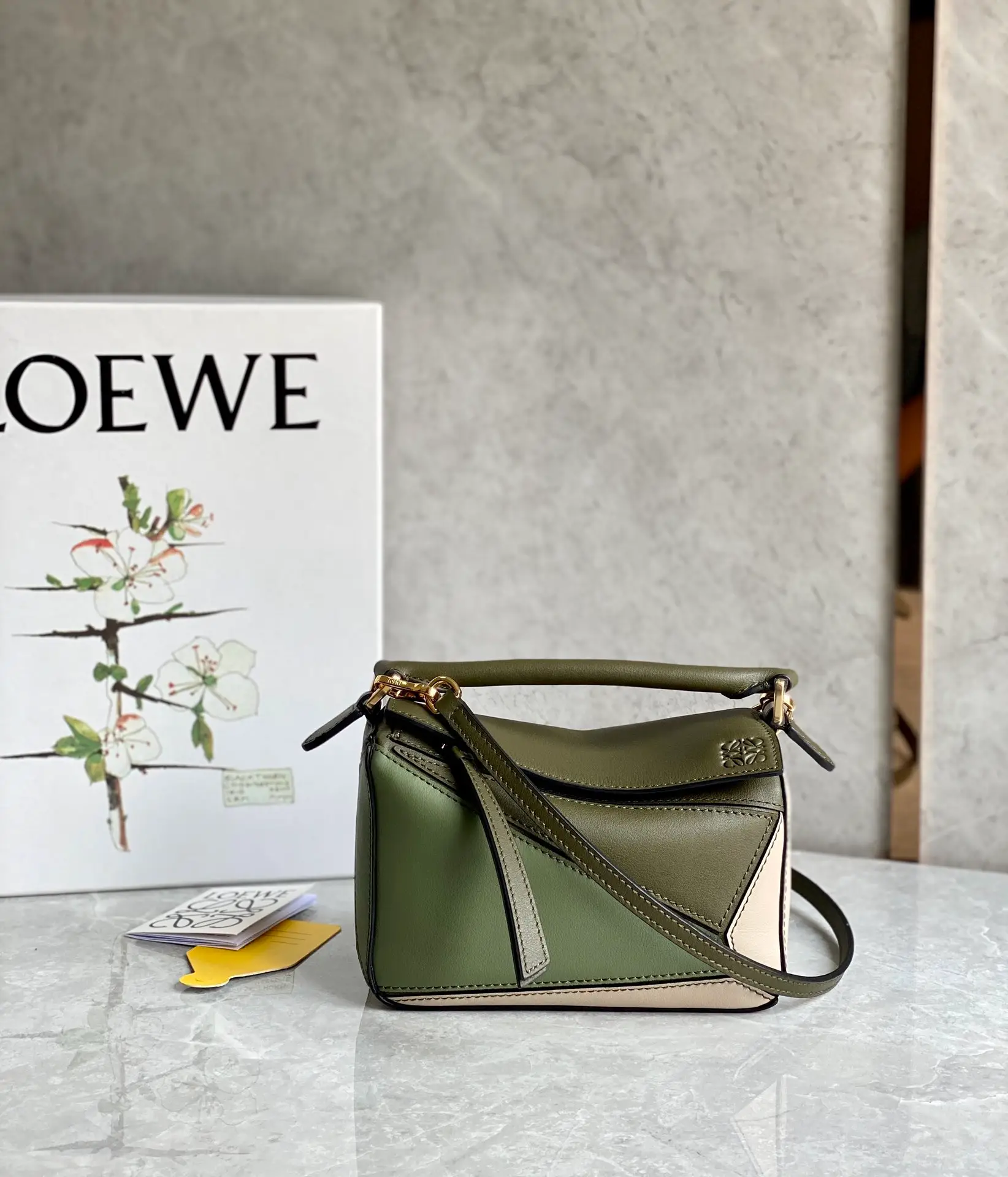 LOEWE-MINI-PUZZLE-BAG-CLASSIC-CALFSKIN-AUTUMN-GREEN-LIGHT-OAT-A510U95X34-4366_1 LOEWE MINI PUZZLE BAG CLASSIC CALFSKIN AUTUMN GREEN LIGHT OAT A510U95X34 4366 1