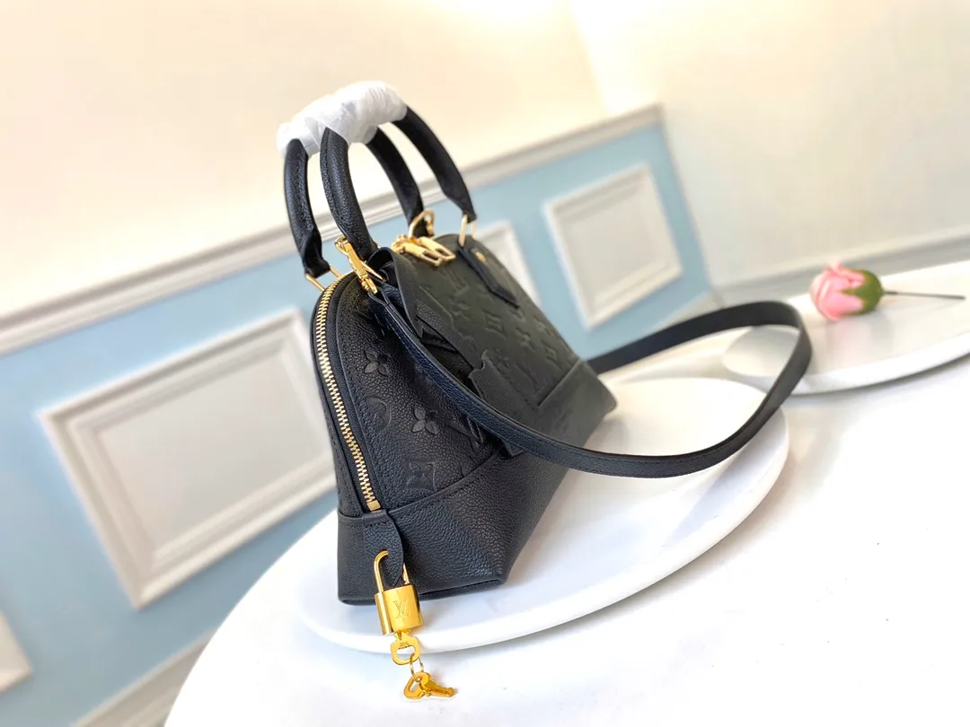 LOUIS VUITTON ALMA BB HANDBAG SUPPLE GRAINED COWHIDE LEATHER BLACK M44829_2 LOUIS VUITTON ALMA BB HANDBAG SUPPLE GRAINED COWHIDE LEATHER BLACK M44829 2