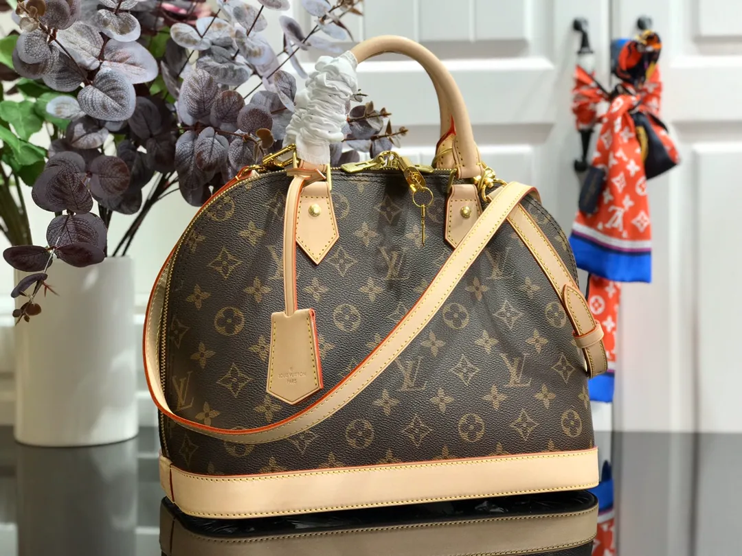 LOUIS VUITTON ALMA MM HANDBAG MONOGRAM COATED CANVAS M40878_2 LOUIS VUITTON ALMA MM HANDBAG MONOGRAM COATED CANVAS M40878 2