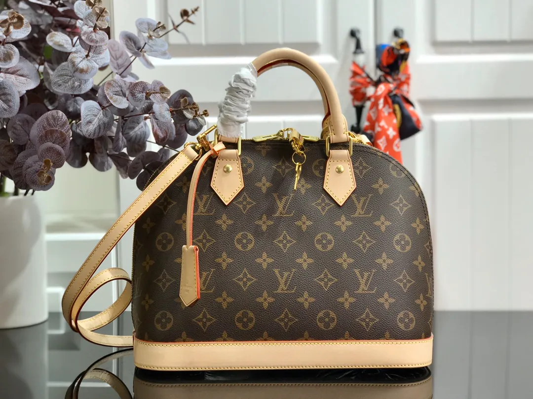 LOUIS VUITTON ALMA MM HANDBAG MONOGRAM COATED CANVAS M40878_3 LOUIS VUITTON ALMA MM HANDBAG MONOGRAM COATED CANVAS M40878 3
