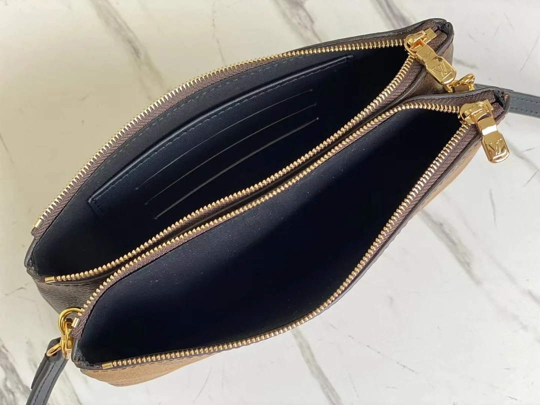 LOUIS VUITTON DOUBLE ZIP POCHETTE BAG MONOGRAM GIANT REVERSE CANVAS M69203_9 LOUIS VUITTON DOUBLE ZIP POCHETTE BAG MONOGRAM GIANT REVERSE CANVAS M69203 9