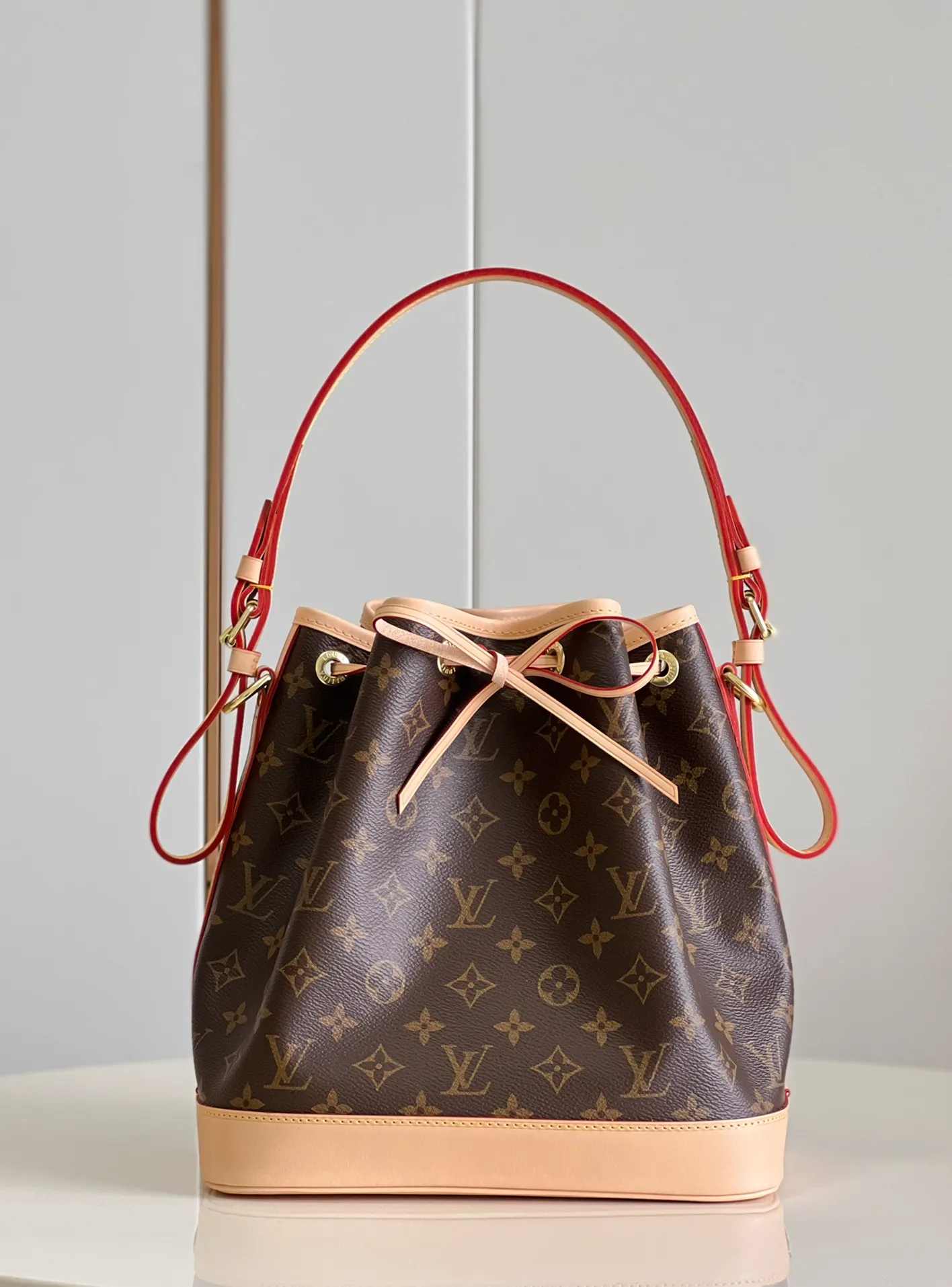 LOUIS VUITTON PETIT NOÉ BUCKET BAG MONOGRAM COATED CANVAS M40818_1 LOUIS VUITTON PETIT NOE BUCKET BAG MONOGRAM COATED CANVAS M40818 1