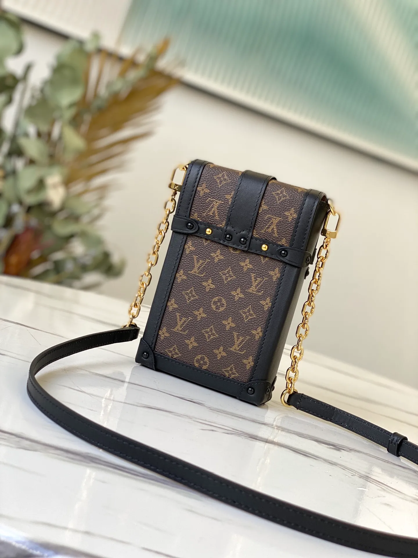 LOUIS VUITTON VERTICAL TRUNK POCHETTE BAG MONOGRAM COATED CANVAS BLACK M63913_3 LOUIS VUITTON VERTICAL TRUNK POCHETTE BAG MONOGRAM COATED CANVAS BLACK M63913 3