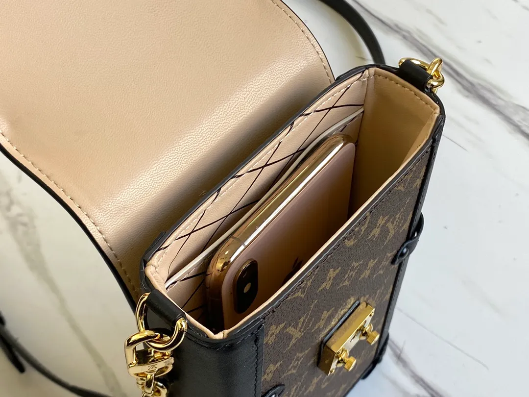 LOUIS VUITTON VERTICAL TRUNK POCHETTE BAG MONOGRAM COATED CANVAS BLACK M63913_5 LOUIS VUITTON VERTICAL TRUNK POCHETTE BAG MONOGRAM COATED CANVAS BLACK M63913 5