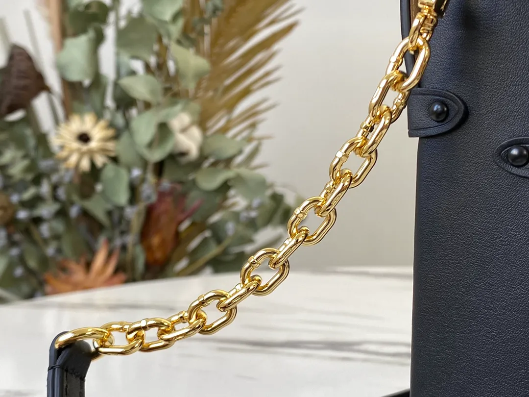 LOUIS VUITTON VERTICAL TRUNK POCHETTE BAG MONOGRAM COATED CANVAS BLACK M63913_8 LOUIS VUITTON VERTICAL TRUNK POCHETTE BAG MONOGRAM COATED CANVAS BLACK M63913 8